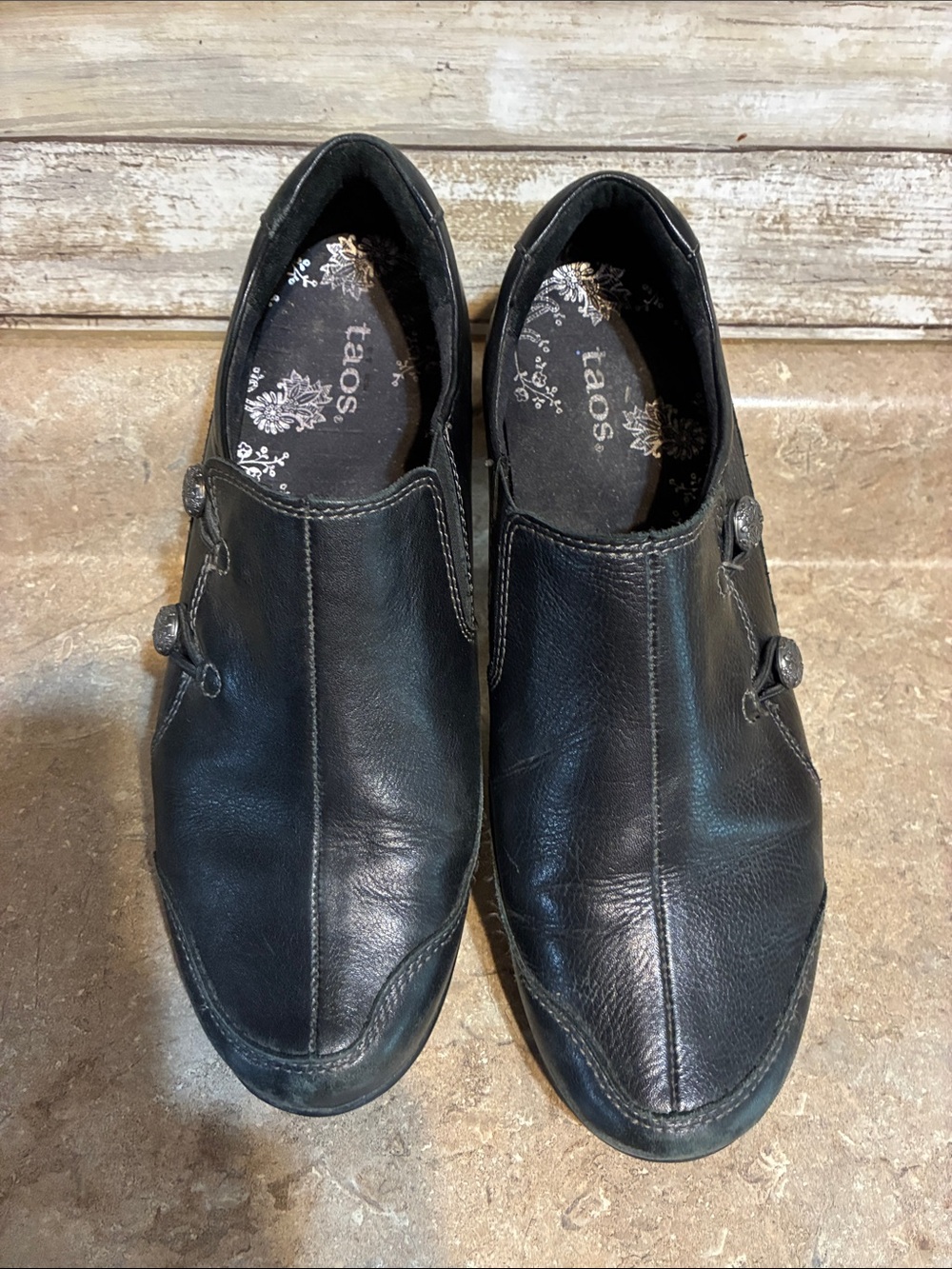 Taos Size 8 Footwear Black Leather Slip-On Loafers with Side Button Detail